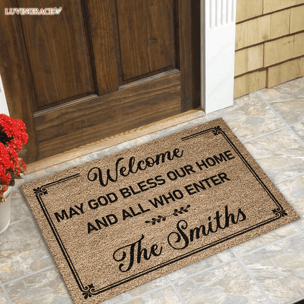 https://luvingrace.com/cdn/shop/files/personalized-may-god-bless-our-home-doormat-219_600x.png?v=1683546821